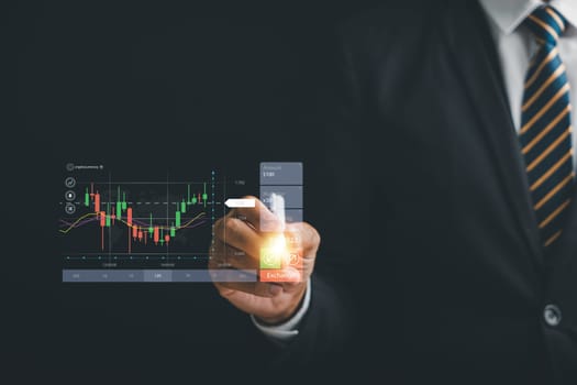 Businessman with digital pen focuses on candlestick chart, making strategic investment decisions in stock market. Dark background conveys sense of determination and success. Technical price graph