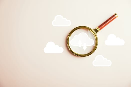 Cloud computing represented by magnifier glass focusing on big data. Downloading and loading information on system network application. Technology and digital solution.