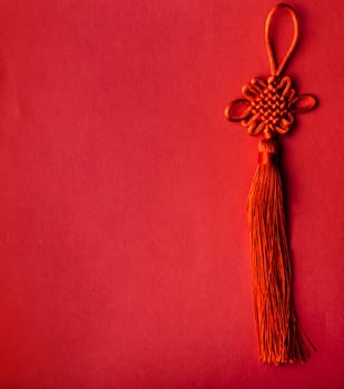 Chinese new year background. Lunar new year symbol with red silk fabric on paper backdrop. Traditional asian celebration 2020.
