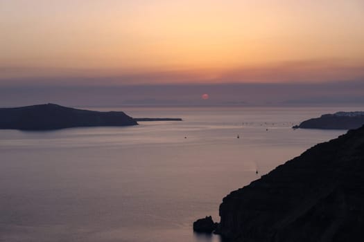 Sunset over Santorini as seen from Fira. Cyclades, Greece
