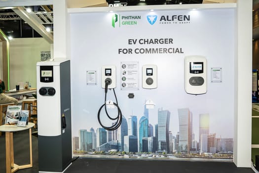 Nonthaburi, Thailand - APR 2, 2023 Electric car and chargers at The 44th Bangkok international motor show 2023 at IMPACT Arena, Muang Thong Thani, Nonthaburi, Thailand.