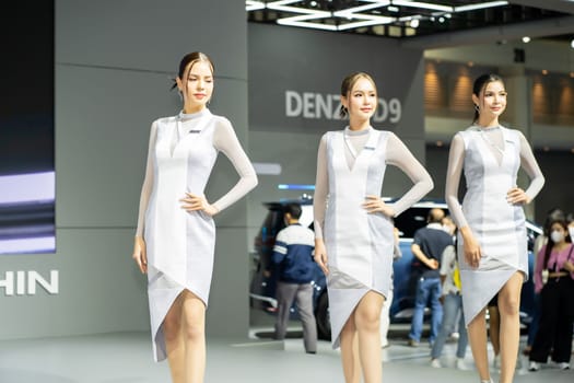 Nonthaburi, Thailand - MAR 26, 2023 Unidentified model poses with a car at The 44th Bangkok international motor show 2023 at IMPACT Arena, Muang Thong Thani, Nonthaburi, Thailand.