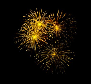 Festive golden fireworks display isolated on black background for celebration and anniversary