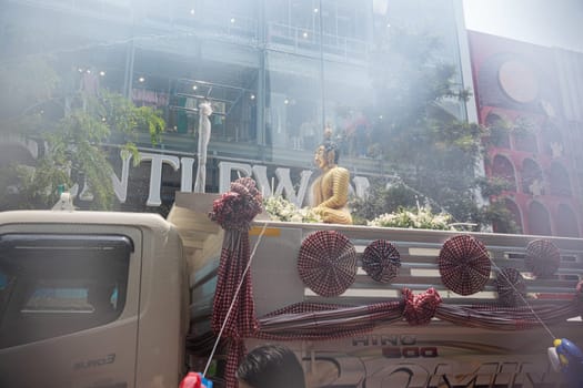 Siam Square, Bangkok, Thailand - APR 13, 2023 Songkran Festival, The short action of people joins celebrations of the Thai New Year or Songkran in Siam Square Bangkok, Thailand.