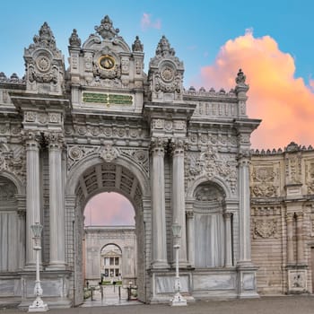 Grand entrance to the 19th century Dolmabahce Palace in Istanbul, Turkey, served as the main residence of the Ottoman sultans for over 60 years. The entrance is decorated with intricate carvings