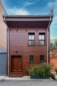 Facade of traditional wooden residential building, at an alley in Kuzguncuk neighborhood, Uskudar district, Istanbul, Turkey