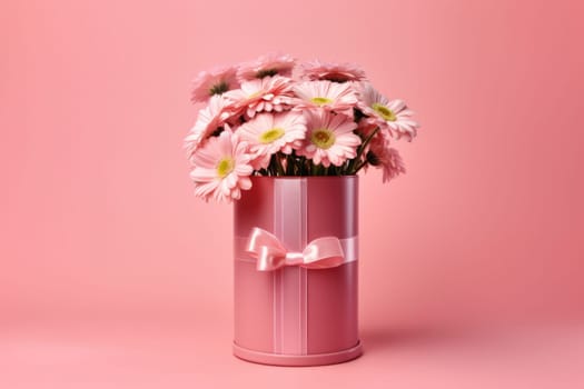 Flowers in a round luxury gift box. Bouquet of pink and white flowers in a paper box. Mockup of a hat box with flowers in pastel colors with free space for text.