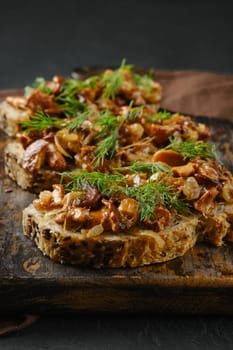 Closeup view of sandwich with fried chanterelle and onion