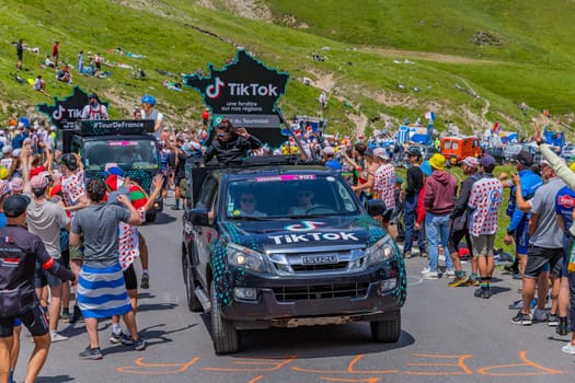 Col du Tourmalet, France - July 06 2023: Caravan car at the top of the Col du Tourmalet in Pyerenees mountains during the stage 6 of Le Tour de France 2023