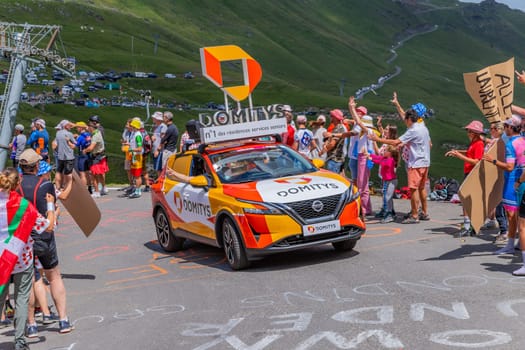 Col du Tourmalet, France - July 06 2023: Caravan car at the top of the Col du Tourmalet in Pyerenees mountains during the stage 6 of Le Tour de France 2023
