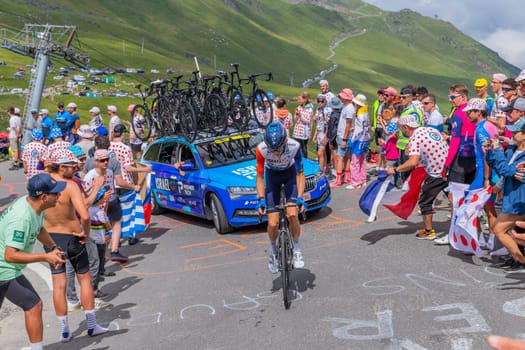 Col du Tourmalet, France - July 06 2023: Krists Neilands climbig the road to Col du Tourmalet in Pyerenees mountains during the stage 6 of Le Tour de France 2023.