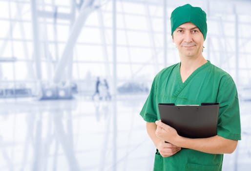 happy male doctor at the hospital