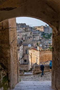 Matera, Italy - 6 May 2023: Old town of Matera (Sassi di Matera), Basilicata, southern Italy. Prehistoric cave dwellings