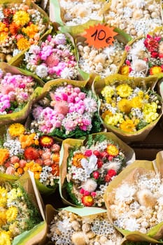Vintage flowers market on public street - retro cottagecore style