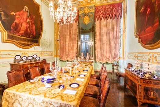 Genova, Italy - 8 August 2023: Spinola Palace. Vintage luxury dining room, elegant furniture - table and chairs