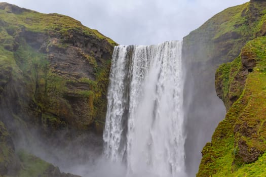 Beautiful Skogafoss waterfall. The most popular destination in Iceland. Water falling down a beautiful valley