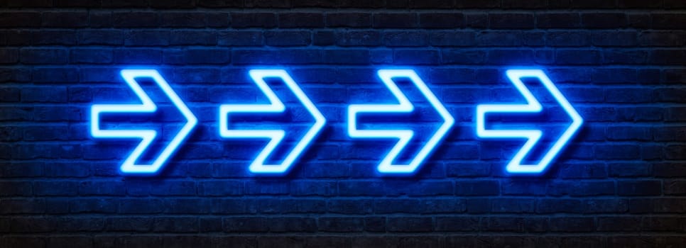 Neon sign on a brick wall - Arrows