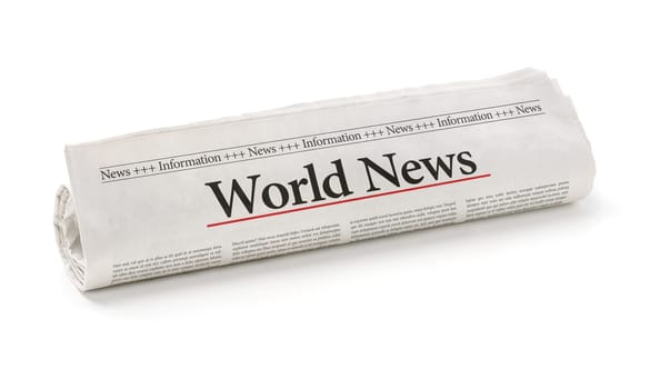Rolled newspaper with the headline World News