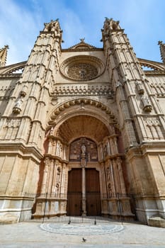 Gothic medieval cathedral La Seu and Royal Palace of La Almudaina. Capital city Palma de Mallorca. Balearic Islands Spain. Travel agency vacation concept.