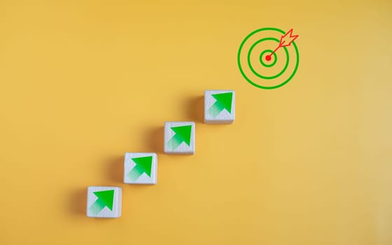 Wood cube block stacking with icon. Concept of business strategy and goal action plan.