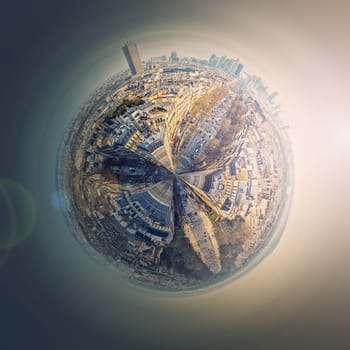 Aerial Paris as a micro planet in space. Sightseeing city panorama in shape o a globe with view to La Defense metropolitan district, France. Champs-Elysee avenue, parisian architecture and landmarks