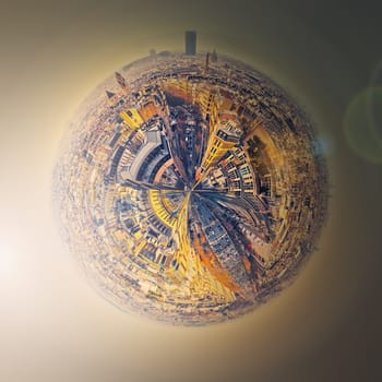 Aerial Paris as a micro planet in space. Panoramic cityscape in shape of a globe with view to parisian avenues and Champs-Elysee, France. Beautiful architecture landmarks, romantic destination