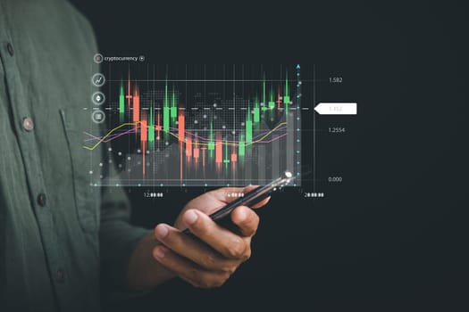 Businessman reveals a growing virtual hologram stock on smartphone, depicting the success and progress of stock market trading. Planning and strategy for business growth. Invest in trading.