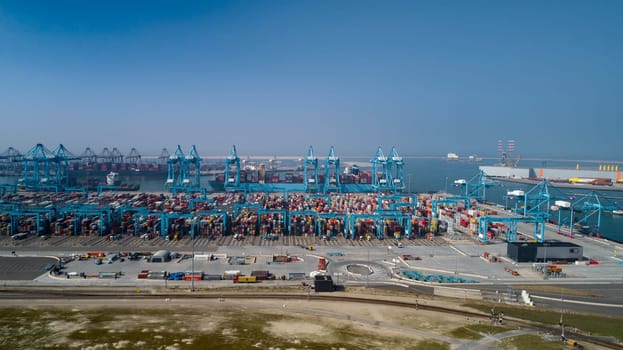 Container ship carrying container box loading in import export and business logistic and transportation