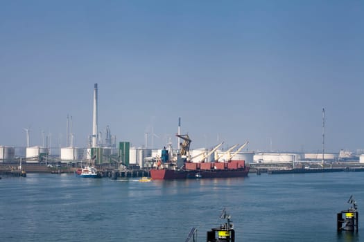 Oil refinery plant from industry zone, Aerial view oil and gas industrial, Refinery factory oil storage tank and pipeline steel