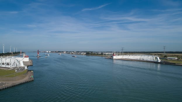Aerial picture of Maeslantkering storm surge barrier on the Nieuwe Waterweg Netherlands it closes if the city of Rotterdam is threatened by floods and is one of largest moving structures on earth