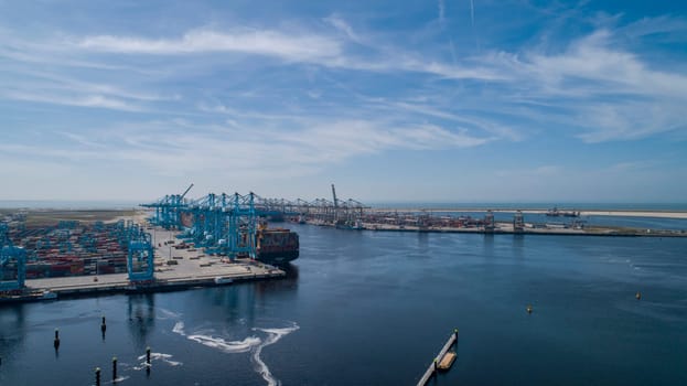 Maasvlakte 2, Rotterdam. Aerial view of container terminal in the harbor MAASVLAKTE, Netherlands. A large containership is unloading