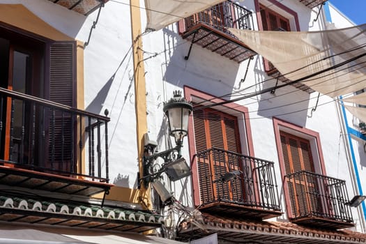 Vintage window on old traditional house in Andalusia, Spain