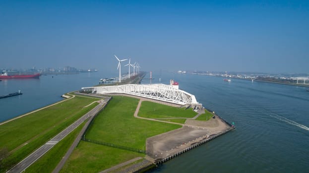 Aerial picture of Maeslantkering storm surge barrier on the Nieuwe Waterweg Netherlands it closes if the city of Rotterdam is threatened by floods and is one of largest moving structures on earth