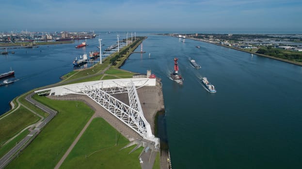 Aerial picture of Maeslantkering storm surge barrier on the Nieuwe Waterweg Netherlands it closes if the city of Rotterdam is threatened by floods and is one of largest moving structures on earth