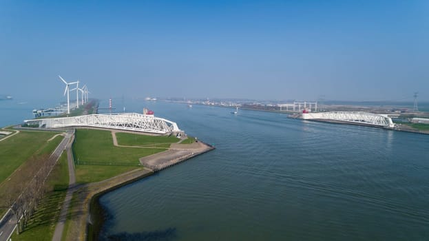 Aerial picture of Maeslantkering storm surge barrier on the Nieuwe Waterweg Netherlands it closes if the city of Rotterdam is threatened by floods and is one of largest moving structures on earth