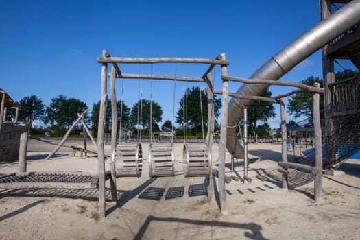 Colorful playground on yard in the park, An image of colorful children playground, without children