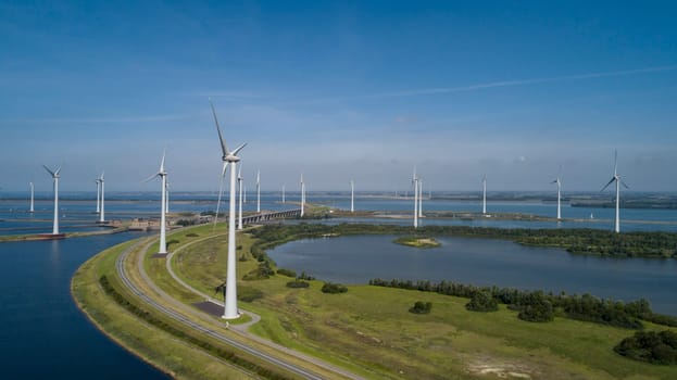 Wind turbine from aerial view, Drone view at windpark krammersluizen a windmill farm in the lake grevelingen in the Netherlands,Sustainable development, renewable energy