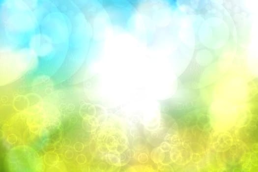 Abstract gradient light blue turquoise yellow green shiny blurred background texture with circular bokeh lights. Beautiful fresh backdrop. Space for design.