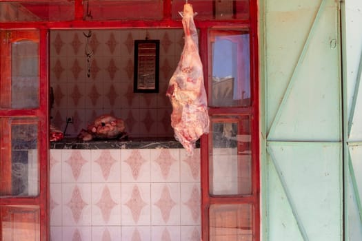 Meat hanging outside a butchers shop in the Merzouga, morocco Africa