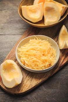 Peeled and  grated yellow zucchini or pumpkin, prepared for cooking