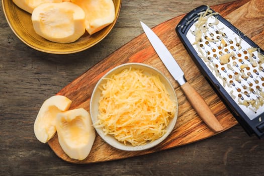 Peeled and  grated yellow zucchini or pumpkin, prepared for cooking