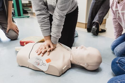 First aid cardiopulmonary resuscitation course using automated external defibrillator device, AED.