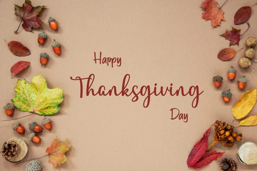 Autumn Background with Autumn Decoration, With Acorns and Fall Leaves and Text Happy Thanksgiving Day