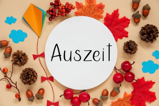 Fall Decoration, Colorful Autumn Leaves and Handicraft Kite, Round Label With German Text Auszeit, Which Means Downtime in English