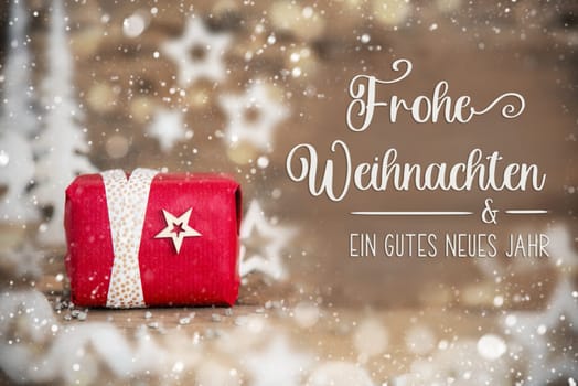 German Text Frohe Weihnachten Und Ein Gutes Neues Jahr, Means Merry Christmas And Happy New Year In English, With Red Christmas Gift, Wooden Background, Winter Decor, Natural