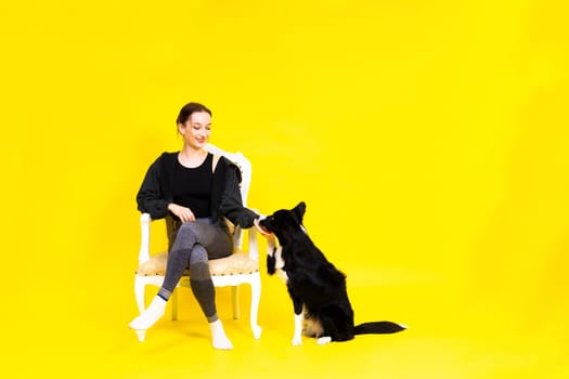 Friendship between people and animals, a studio shot, love, tender, warm feeling and emotion