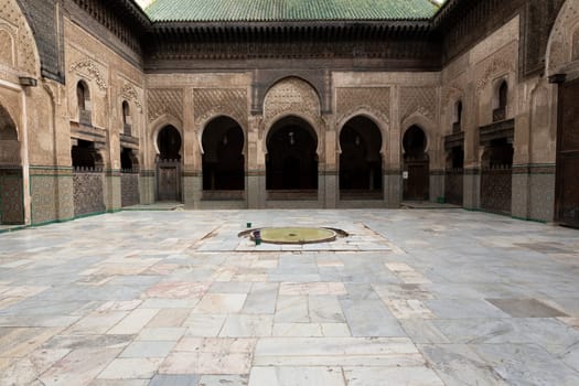 Inside interior of The Madrasa Bou Inania ( Medersa el Bouanania ) is acknowledged as an excellent example of Marinid architecture. Souk Medina of Fez, Morocco