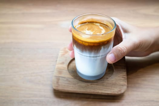 Dirty coffee on wooden table, stock photo