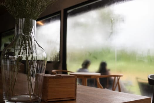 Looking at the rain through the window, stock photo