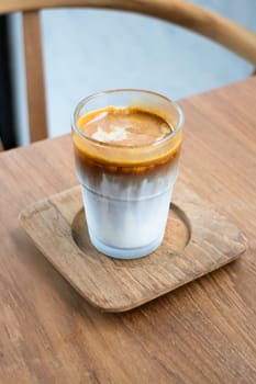 Dirty coffee on wooden table, stock photo
